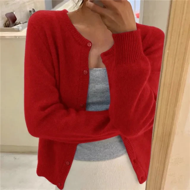 Back view of cropped knit cardigan showing relaxed fit and clean finish