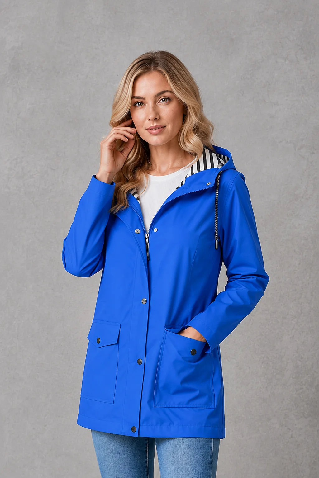 Yellow hooded jacket for women with mid-thigh length and roomy fit for comfortable movement