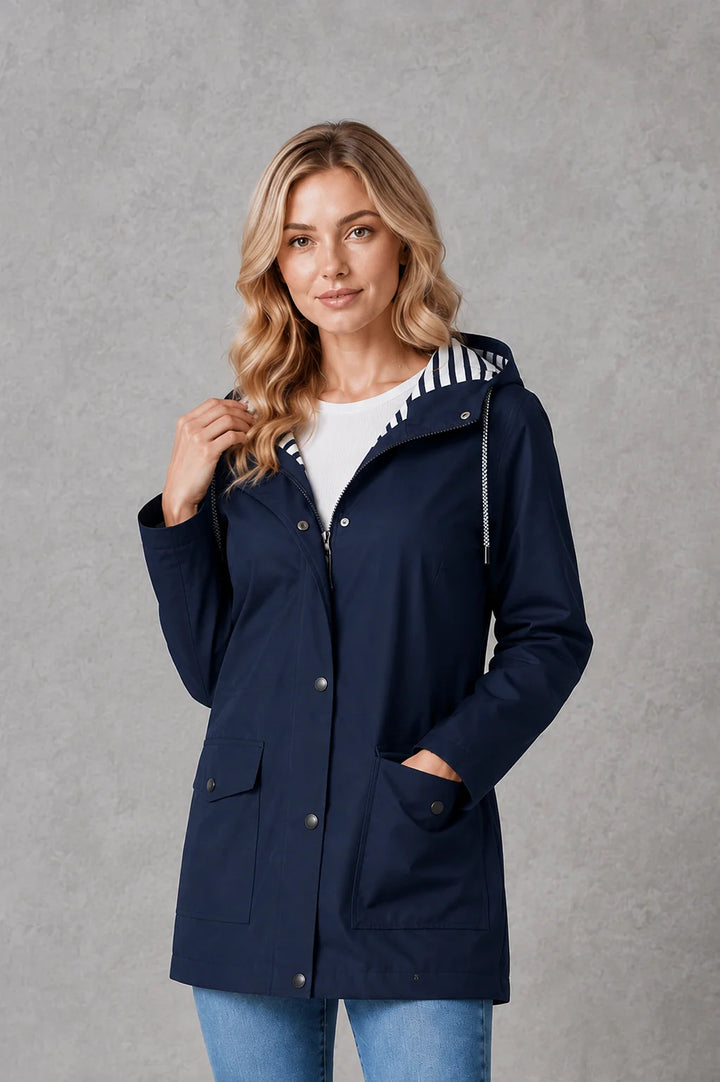 Hooded raincoat in yellow with practical patch pockets and water-resistant outer fabric