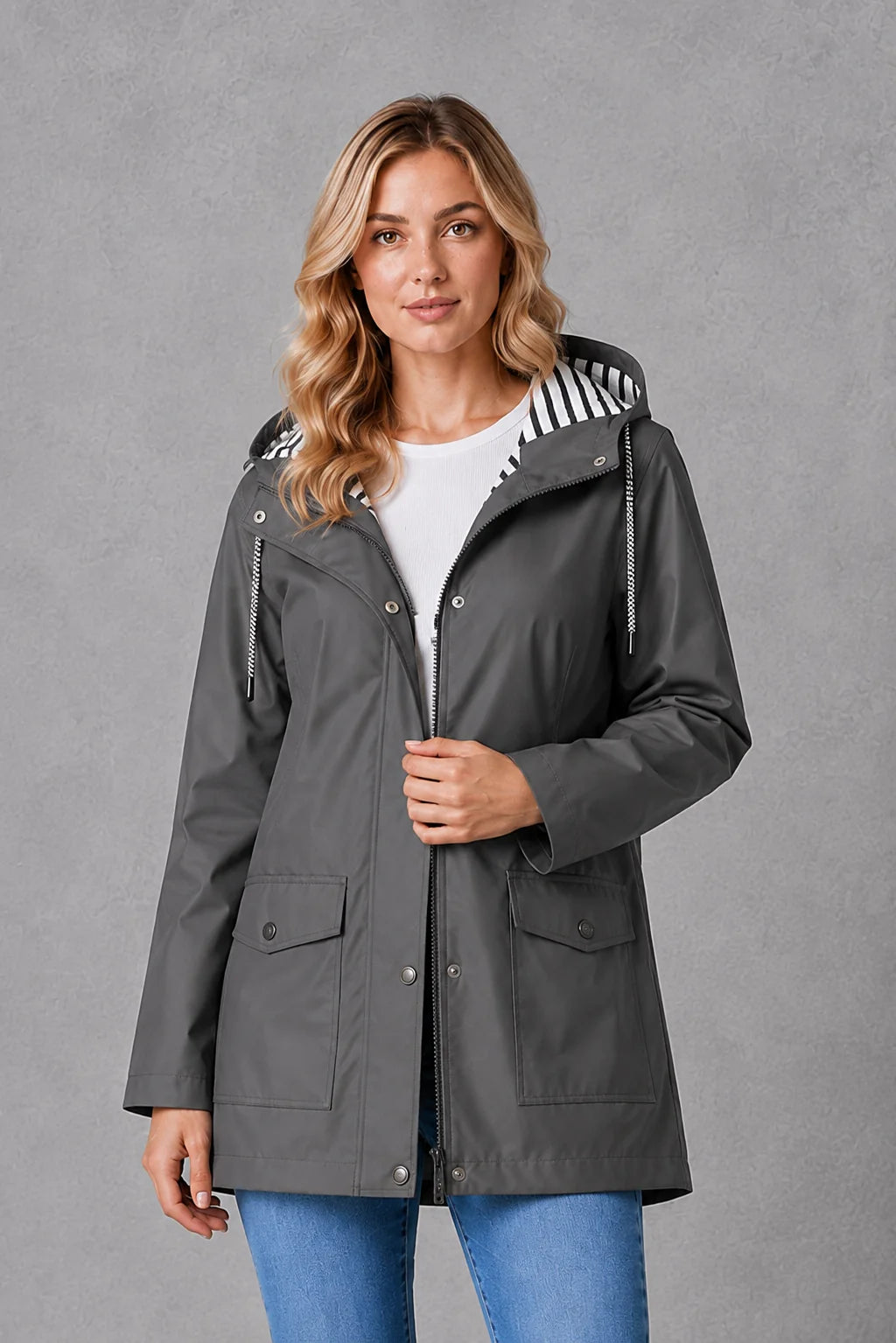 Women's yellow raincoat with relaxed silhouette and hood for changeable weather protection