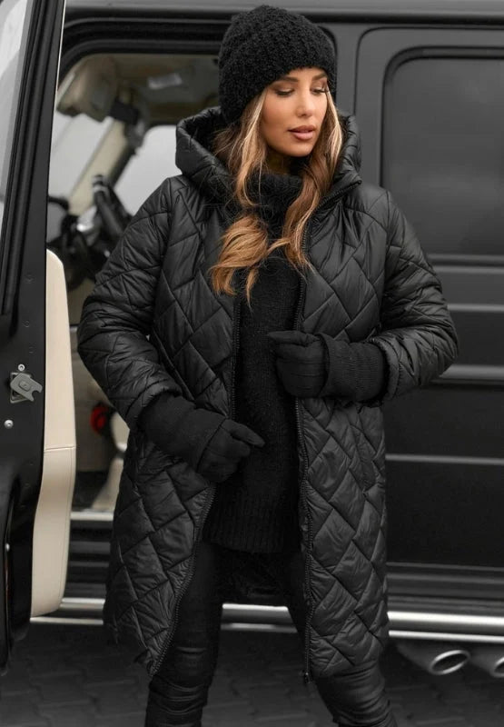 Close-up view of women's quilted puffer coat showing diamond panel stitching detail and zip front