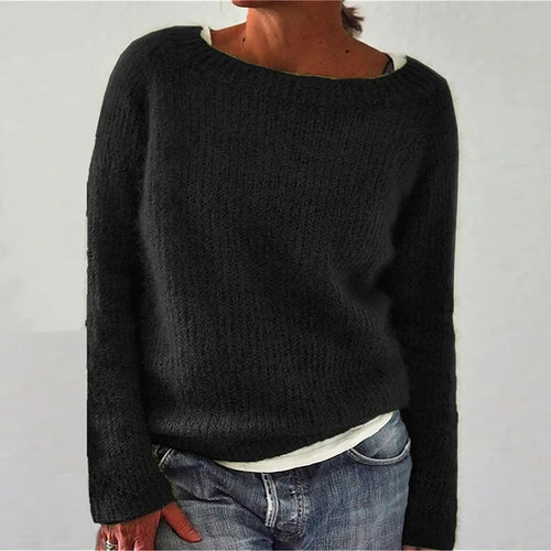 Women's relaxed knit jumper in black with boat neckline and loose fit silhouette