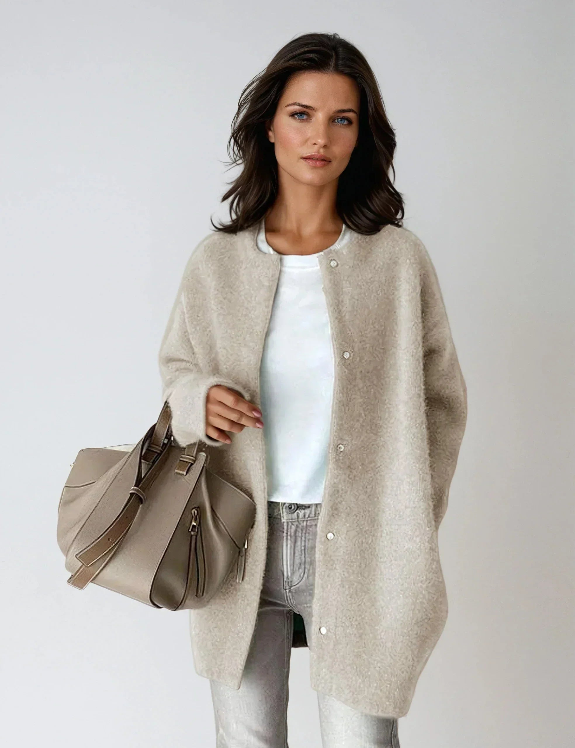 Women's wool blend cardigan in beige with button closure and relaxed fit for layering