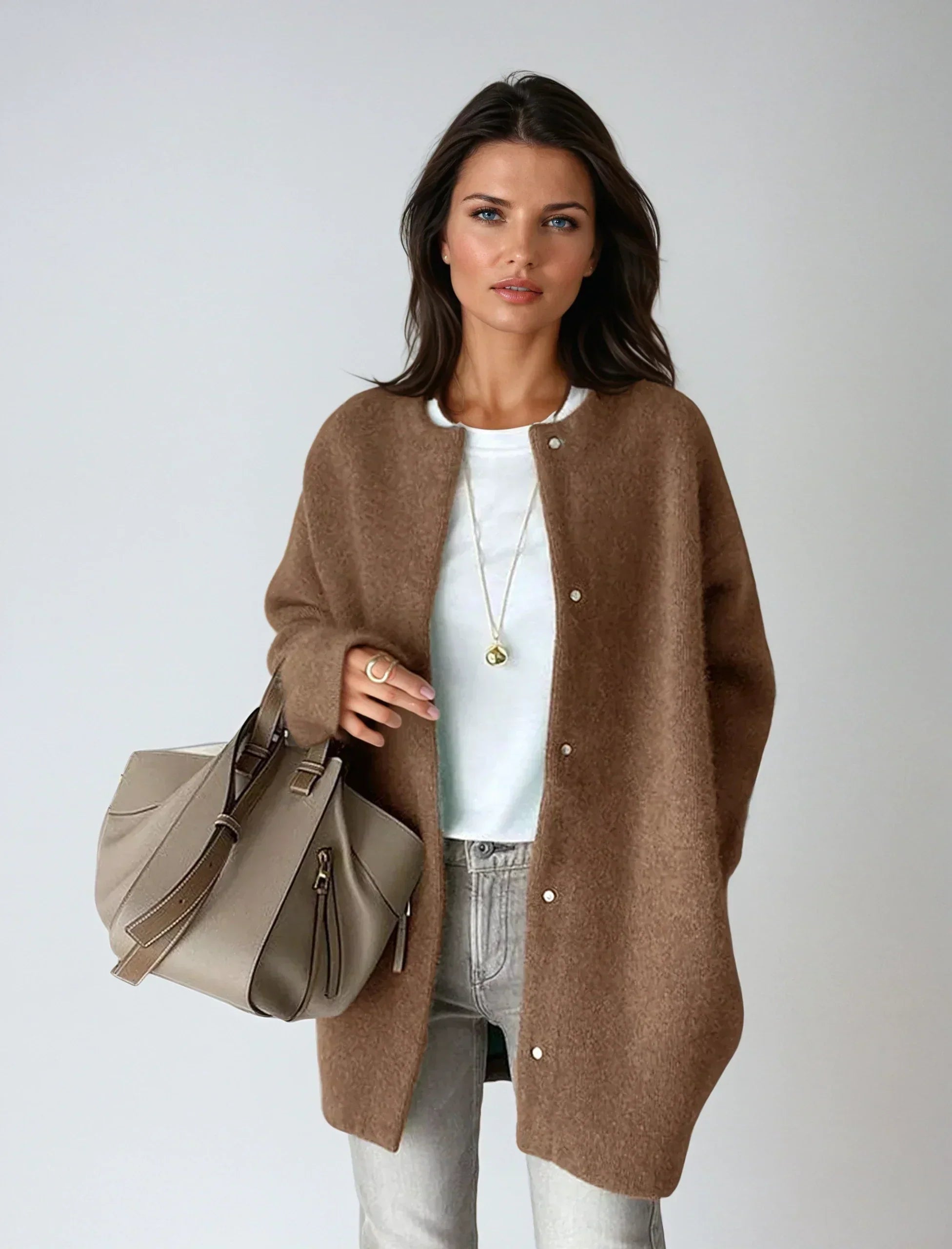 Close-up of women's wool blend cardigan showing soft fabric texture and button detail