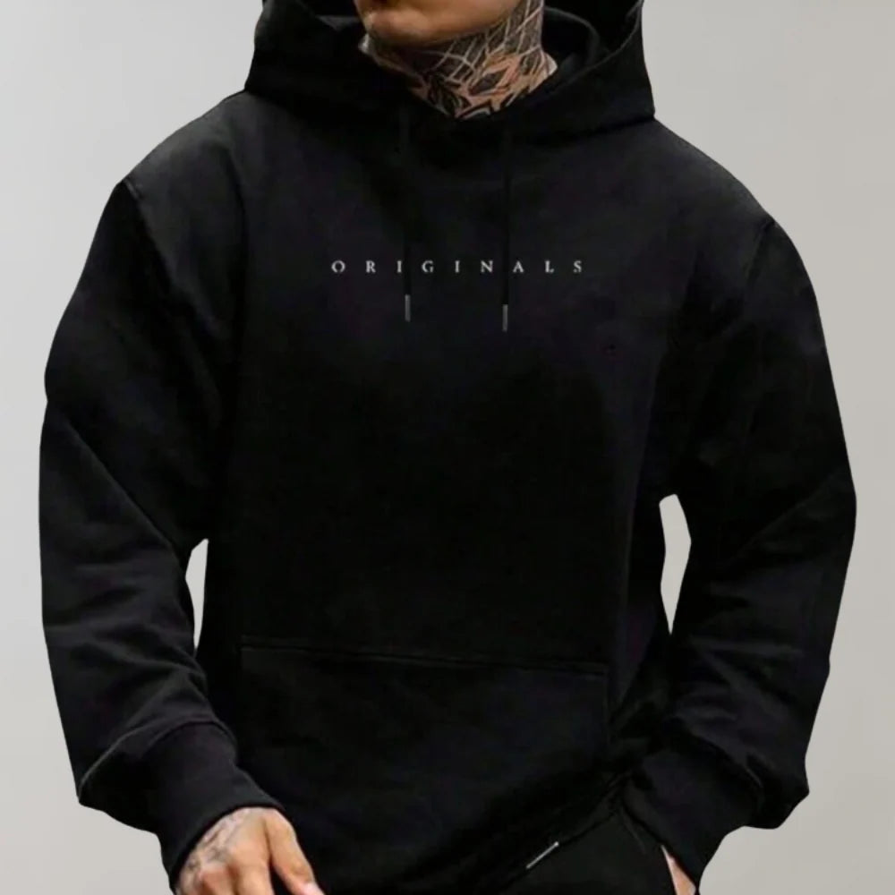 Men's oversized hoodie in black with minimalist chest print and kangaroo pocket detail
