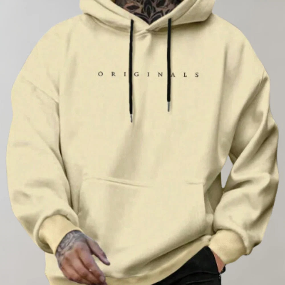Detail shot of men's hoodie kangaroo pocket and fleece-backed fabric texture