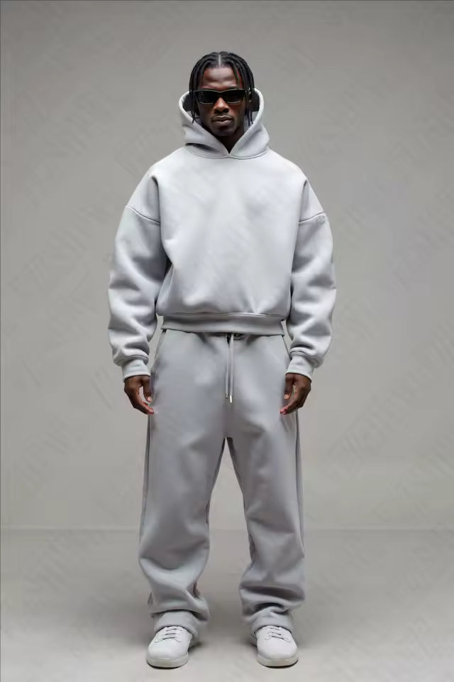 Men's loungewear set in navy featuring oversized hoodie and matching joggers