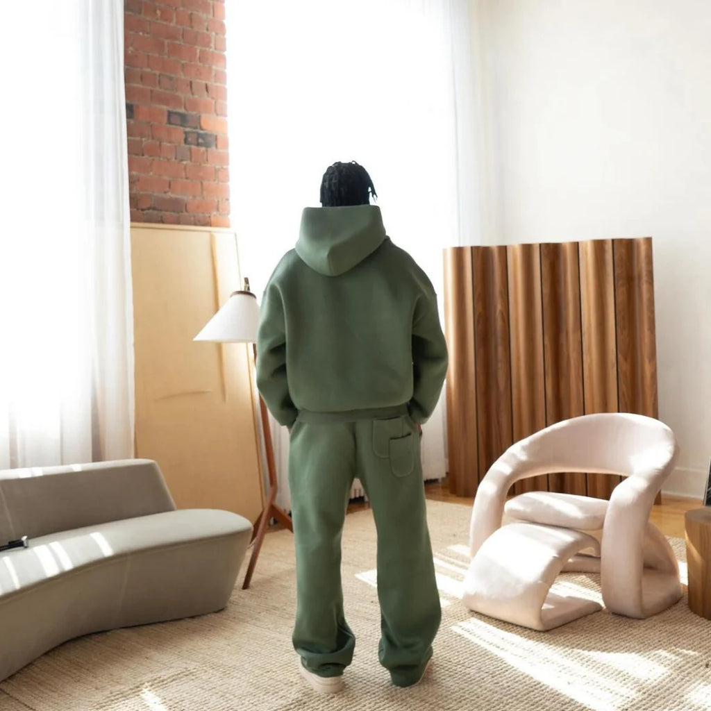 Men's navy hoodie and joggers set with tapered legs and ribbed detailing