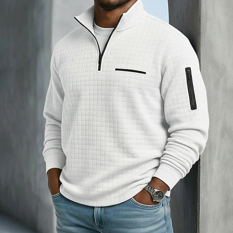 Men's quilted half-zip sweatshirt styled with denim jeans for casual everyday wear