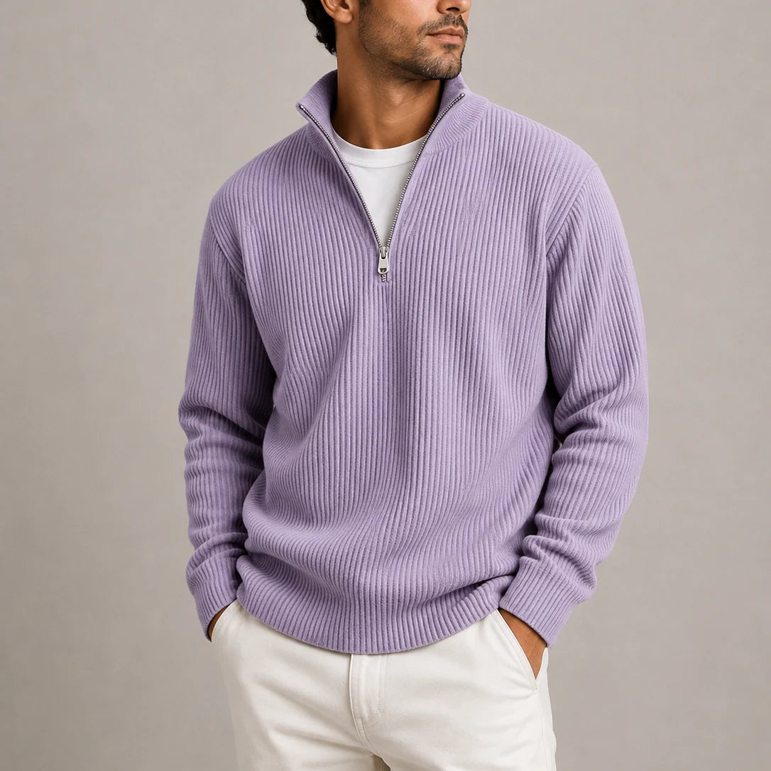 Detail of stand collar and zip closure on men's textured knit jumper
