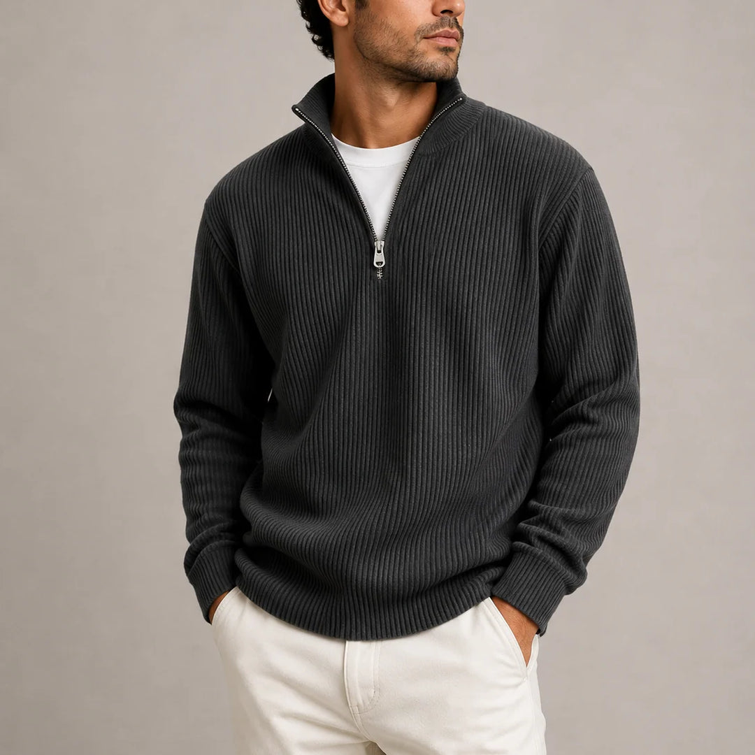 Full-length view of men's ribbed quarter-zip jumper with tailored trousers