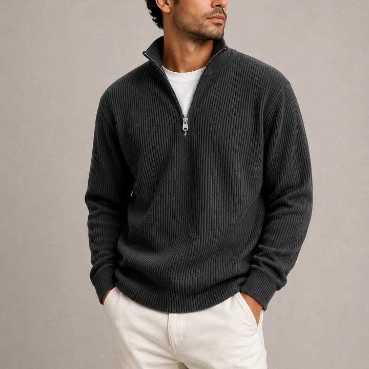 Full-length view of men's ribbed quarter-zip jumper with tailored trousers