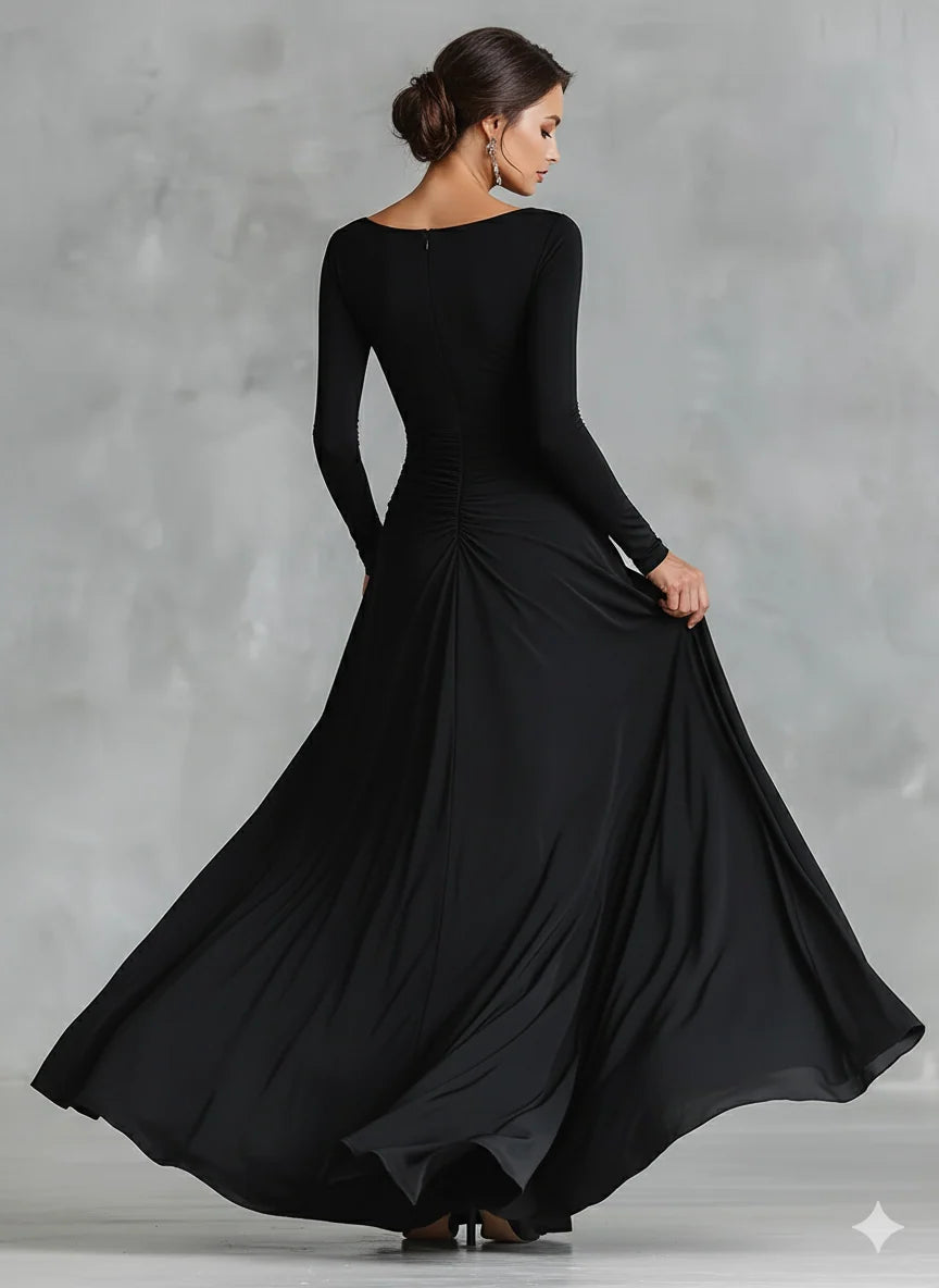 Side angle of floor-length maxi dress showing fitted bodice and dramatic skirt drape