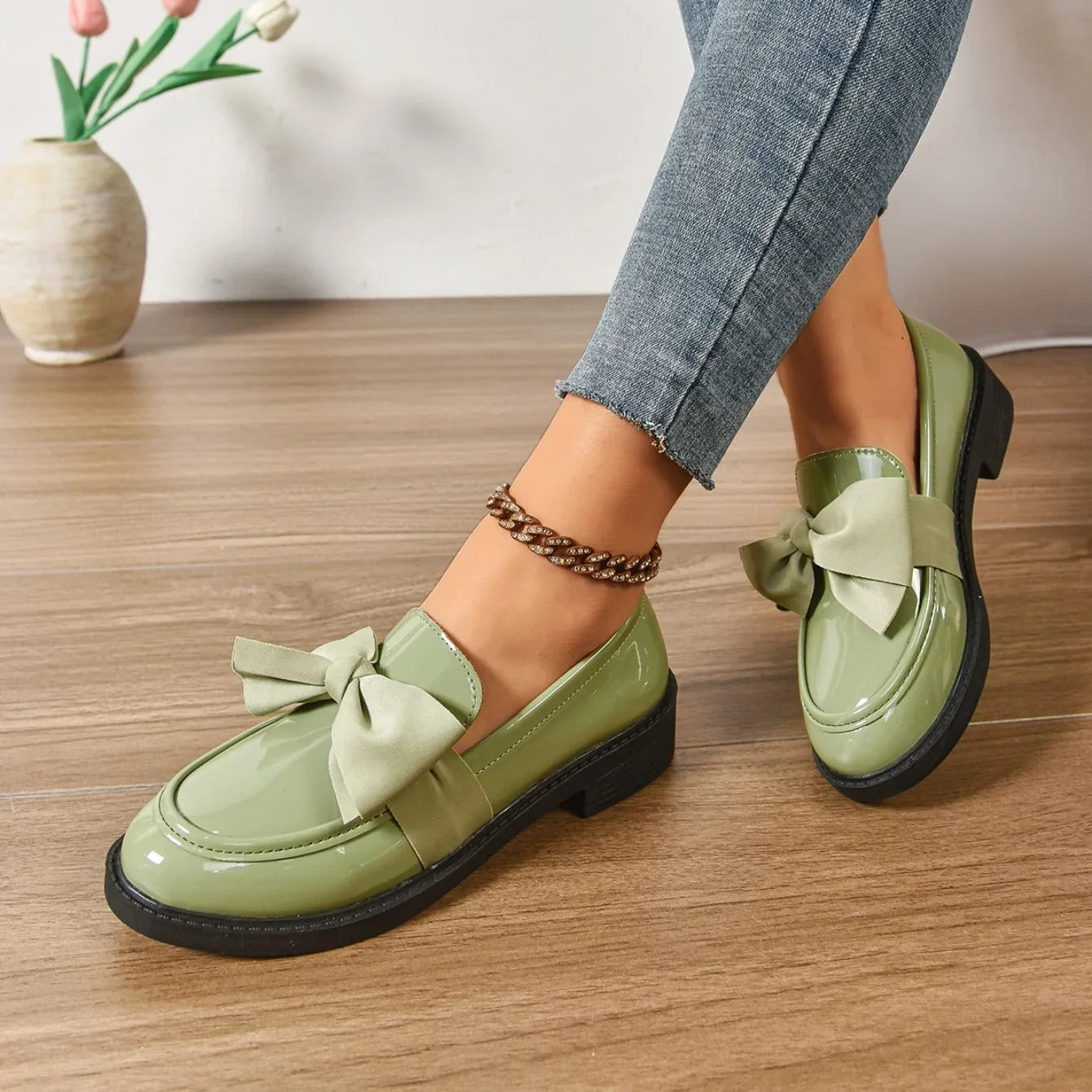 Women's chunky sole loafers with decorative bow and low heel height