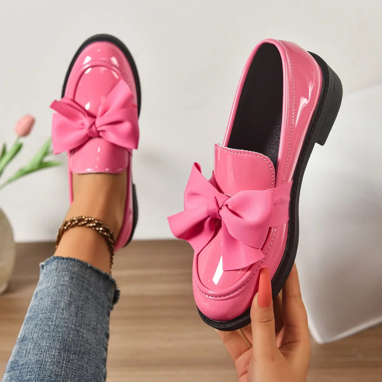 Women's slip-on loafers with patent finish and chunky sole detail