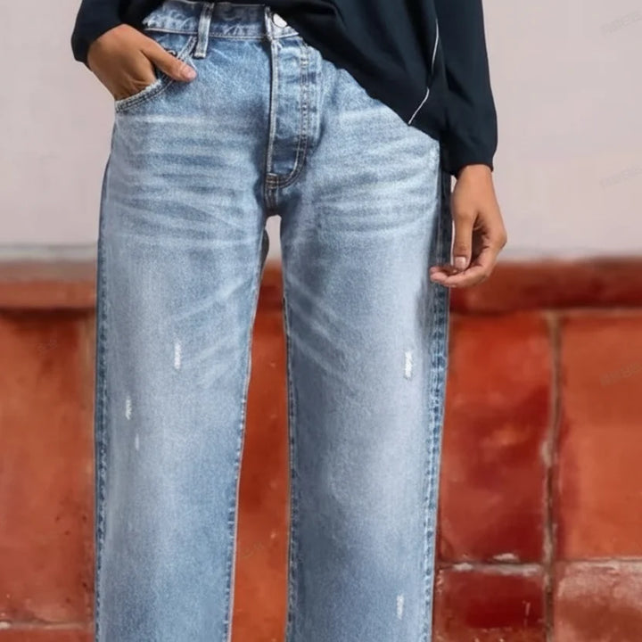 Cropped wide-leg jeans styled with casual footwear for weekend look