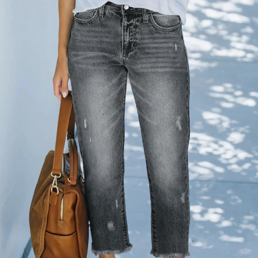 Woman in cropped jeans demonstrating relaxed fit and comfortable drape