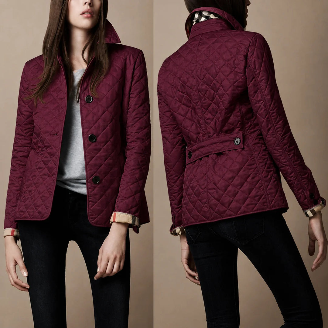 Back view of women's quilted jacket showing diamond-stitched pattern and fitted silhouette