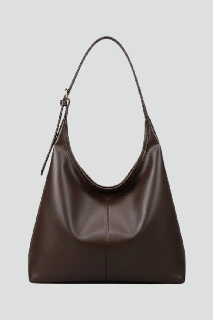 Women's slouchy hobo bag in chocolate brown with curved shoulder strap and centre stitching detail