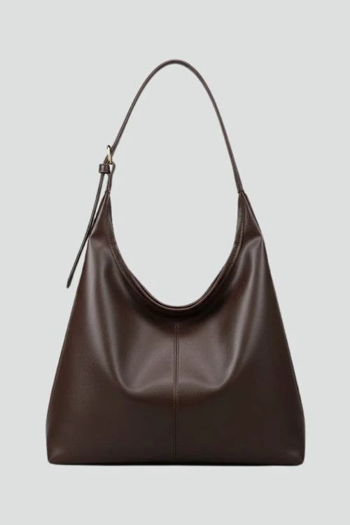 Women's slouchy hobo bag in chocolate brown with curved shoulder strap and centre stitching detail