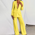 Women's tailored suit set in bright yellow with fitted blazer and straight-leg trousers