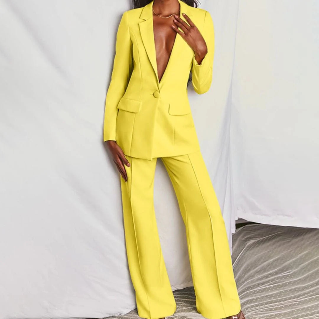 Women's tailored suit set in bright yellow with fitted blazer and straight-leg trousers