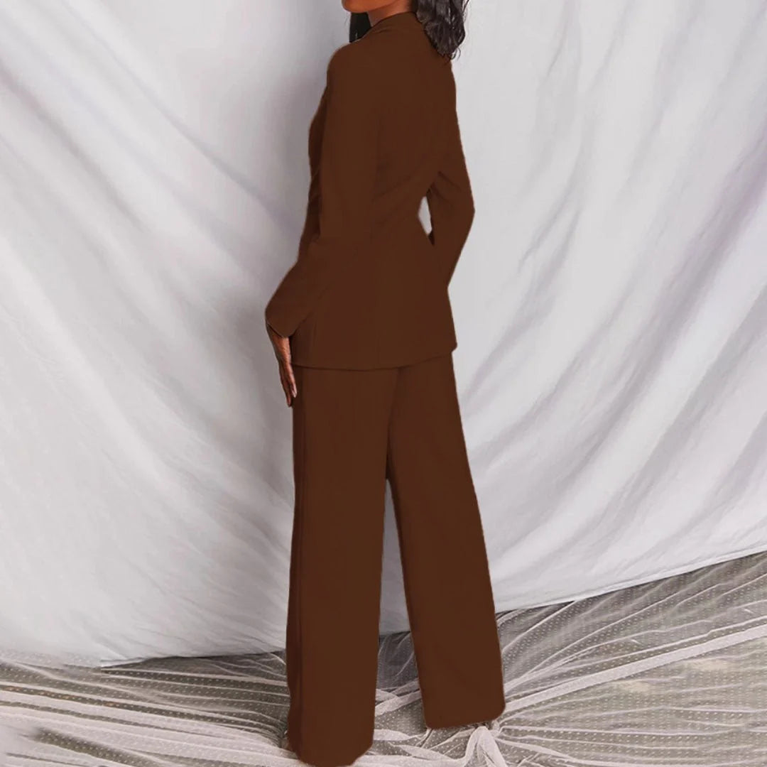 Black women's suit set displaying formal tailored silhouette and straight cut