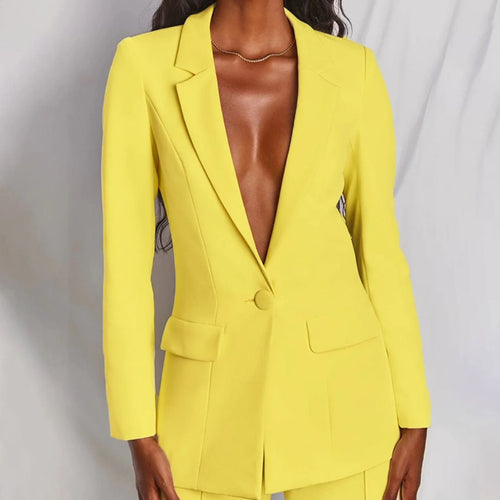 Close-up of single-button closure and notched lapel on women's tailored blazer