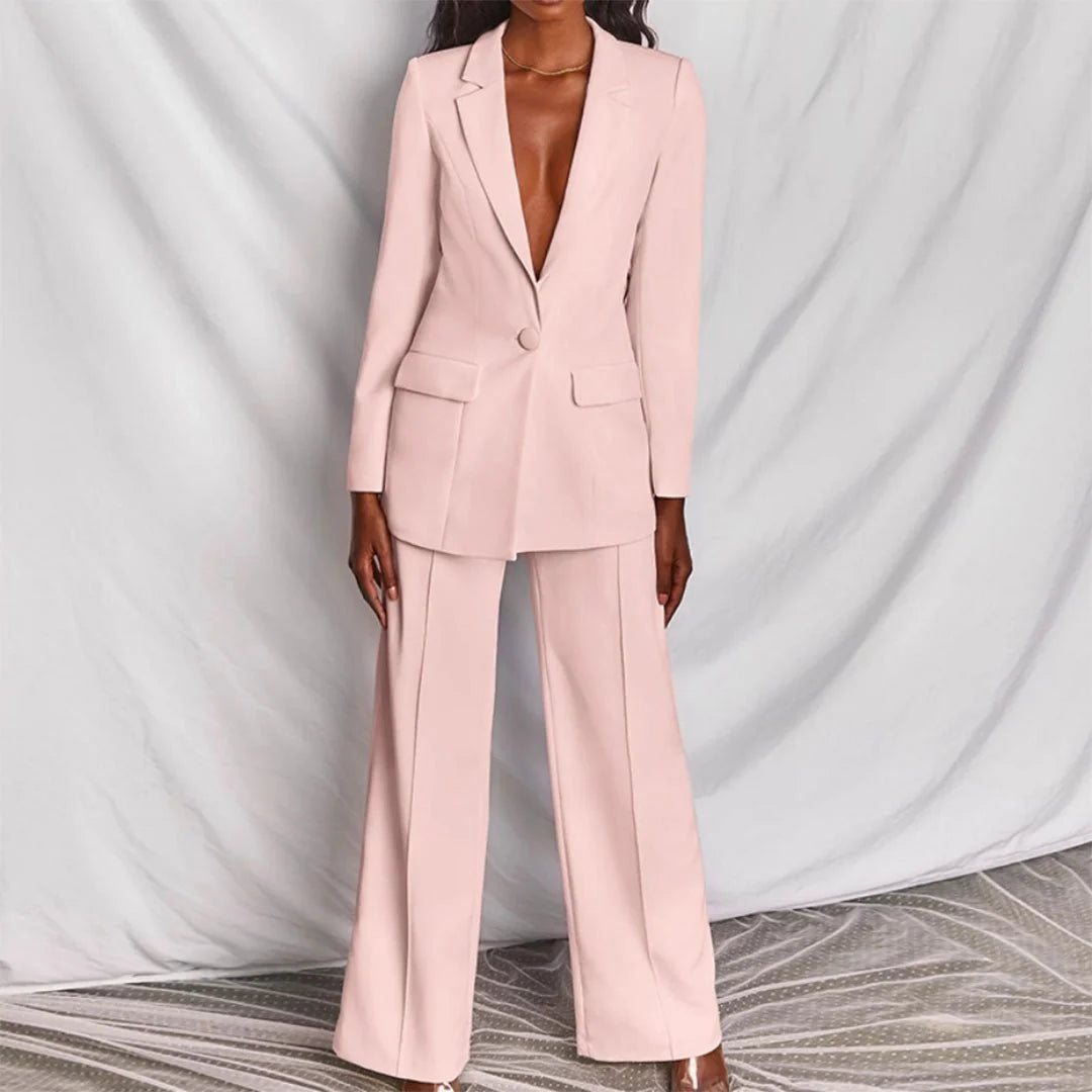 Women's suit set styled with heels showing fitted blazer and coordinated trousers