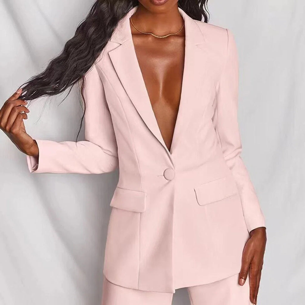 Women's suit set in pink showing deep V-neckline and button closure