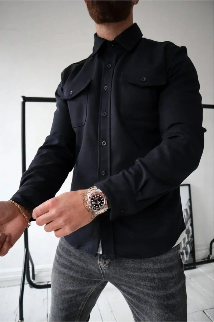 Detail of smooth fabric finish and relaxed cut on men's overshirt