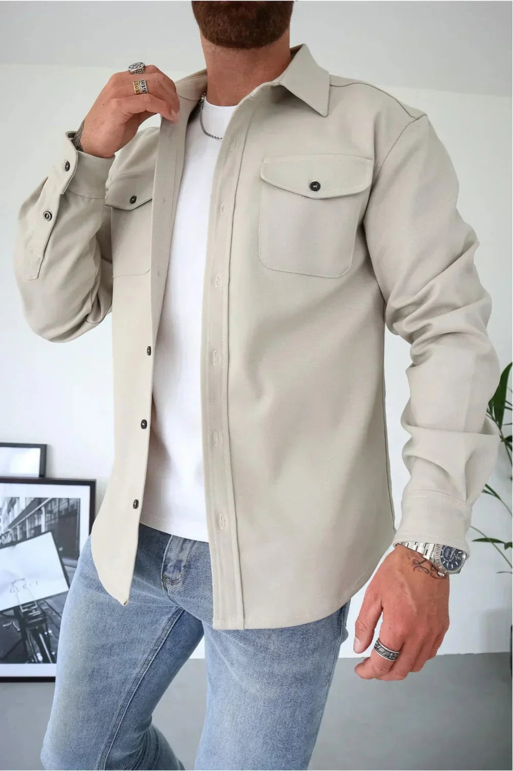 Back view of men's overshirt displaying relaxed fit and structured fabric drape