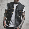 Men's distressed denim vest with button-up front and metallic stud detailing on shoulders