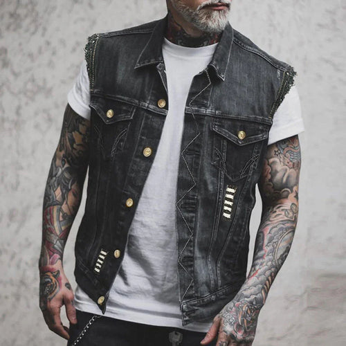Men's distressed denim vest with button-up front and metallic stud detailing on shoulders