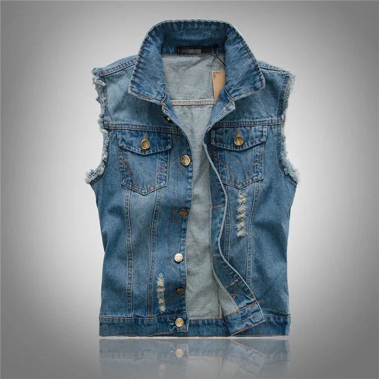 Men's denim vest styled over white tee showcasing rugged casual aesthetic