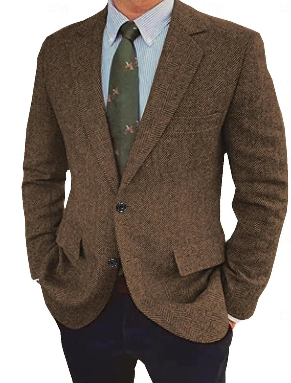Men's brown herringbone tweed blazer with two-button closure and notched lapels styled over striped shirt