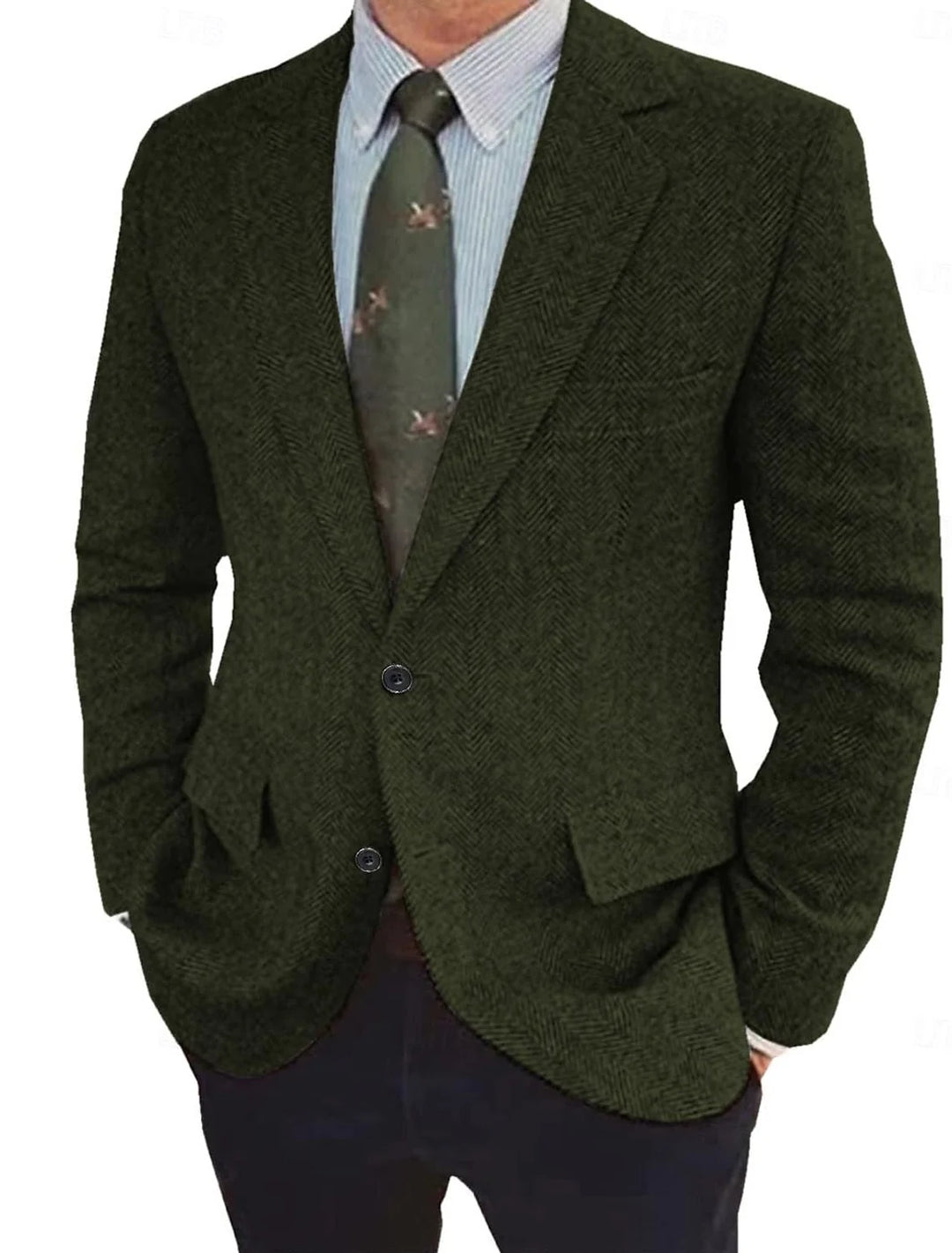Close-up view of men's herringbone tweed blazer showing structured woven fabric texture and button detail