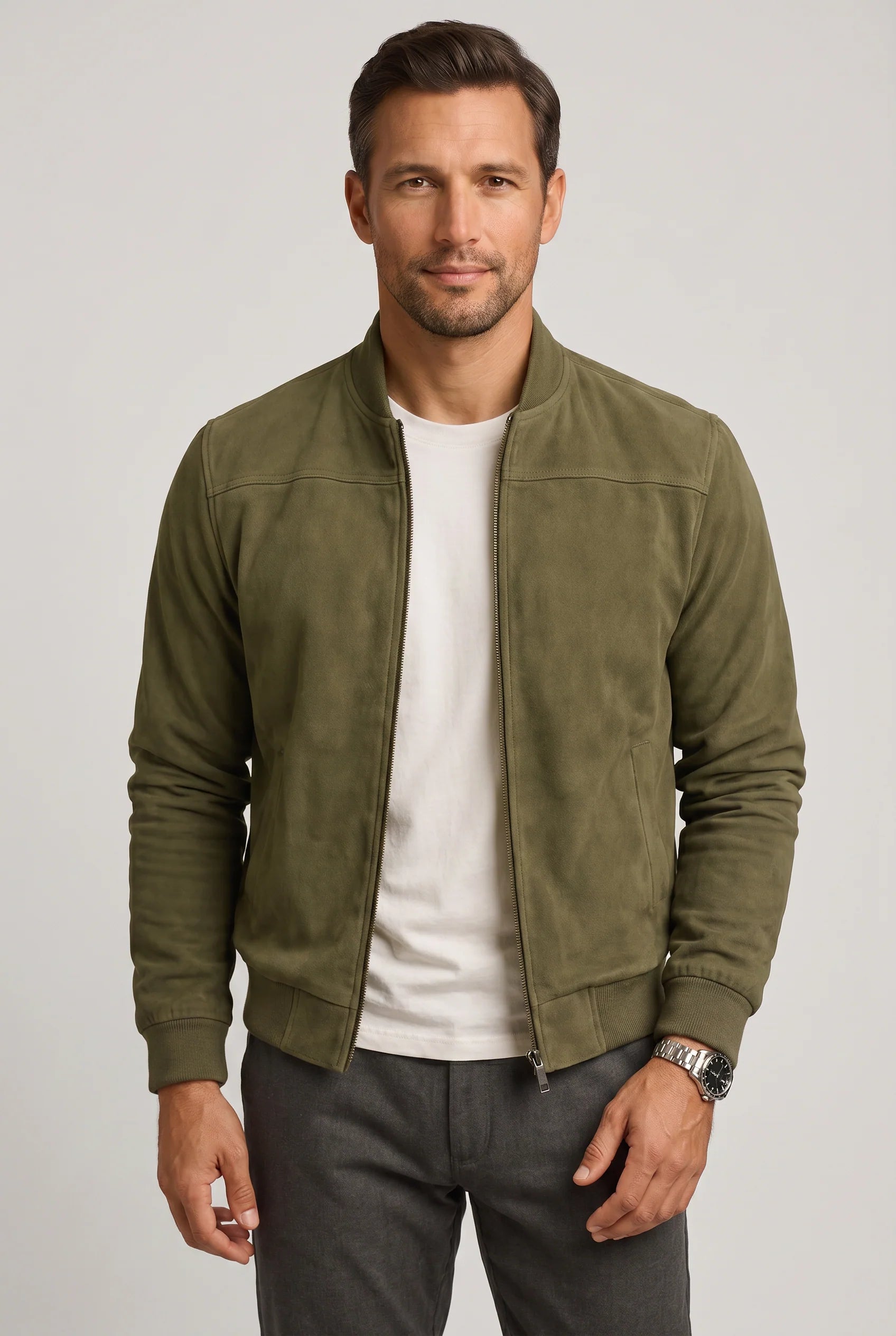 Detail shot of ribbed hem and cuffs on men's suede bomber jacket