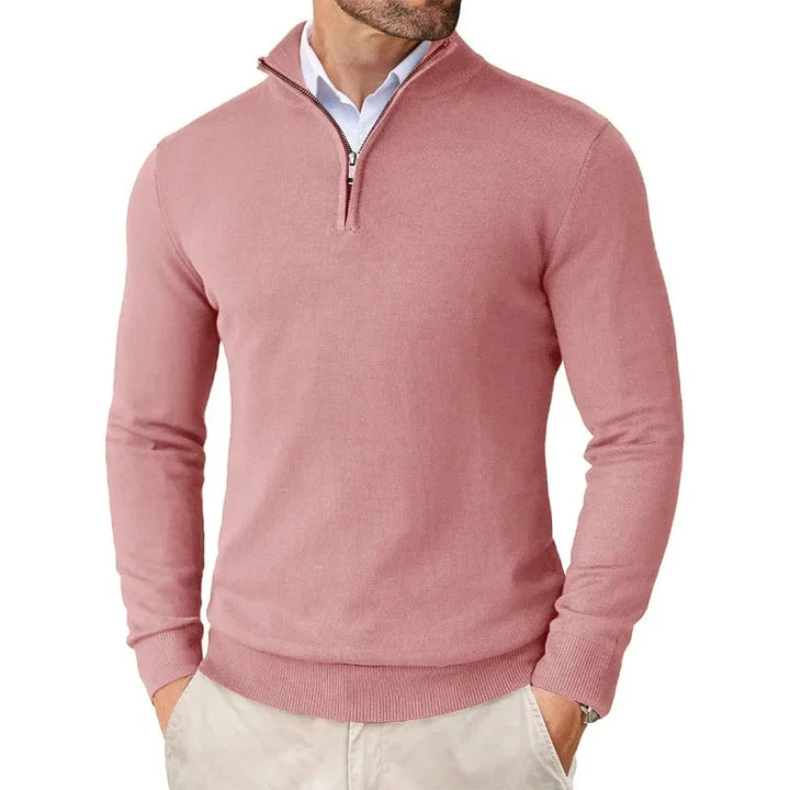 Back view of men's half-zip jumper showing ribbed hem and shoulder seam construction