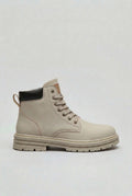 Men's lace-up boots with chunky lug sole in light grey, side profile view showing high ankle design