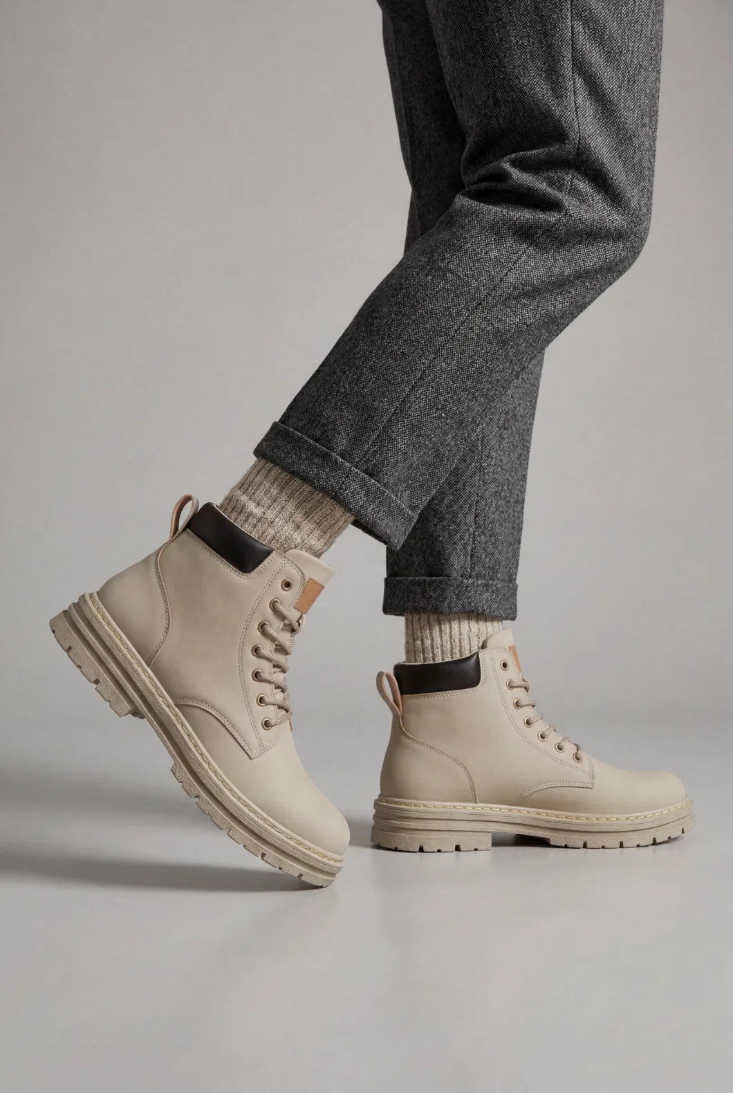 Men's lace-up boots with adjustable lacing and supportive ankle structure, neutral colourway