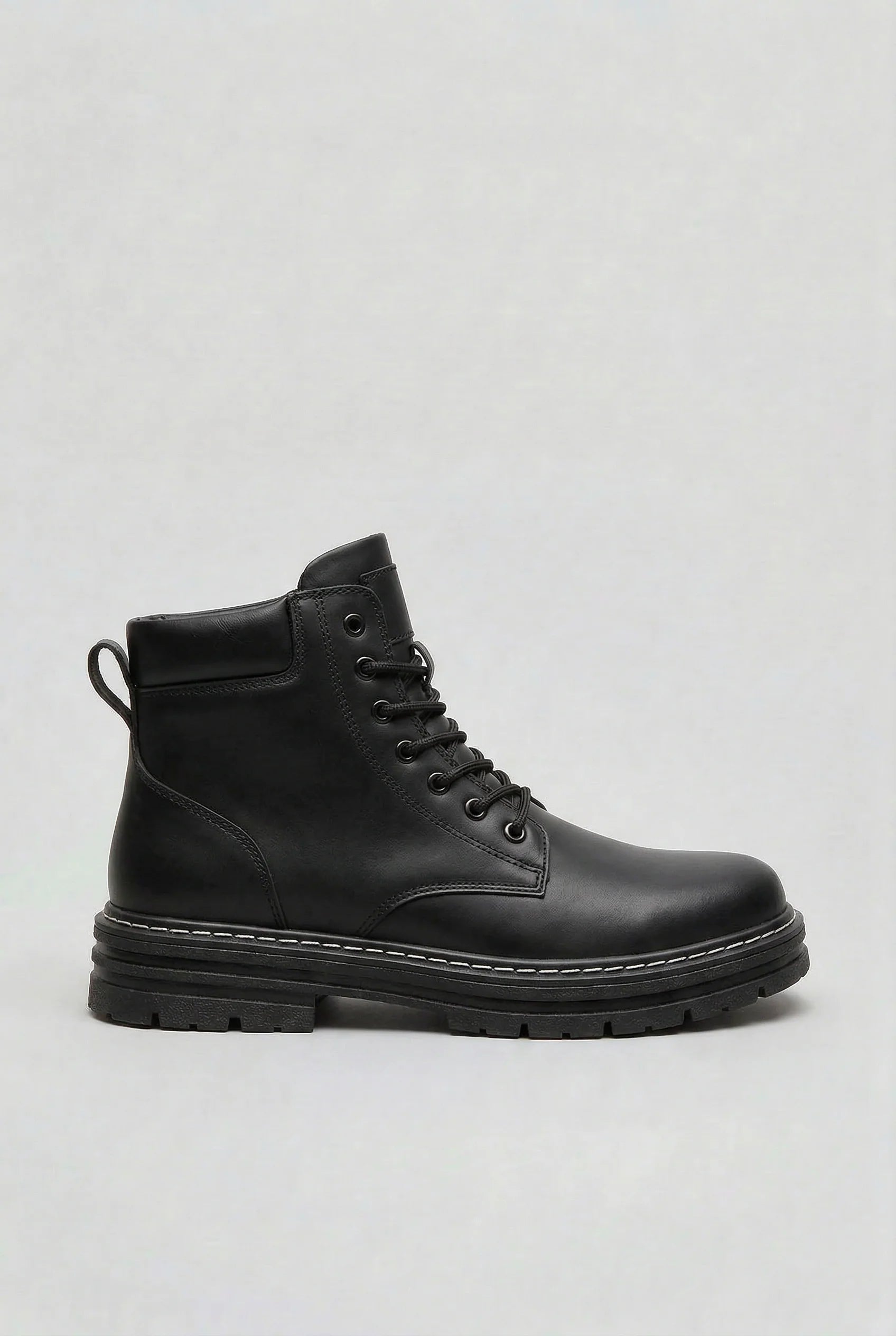 Men's lace-up boots in light grey with structured upper and rugged sole design