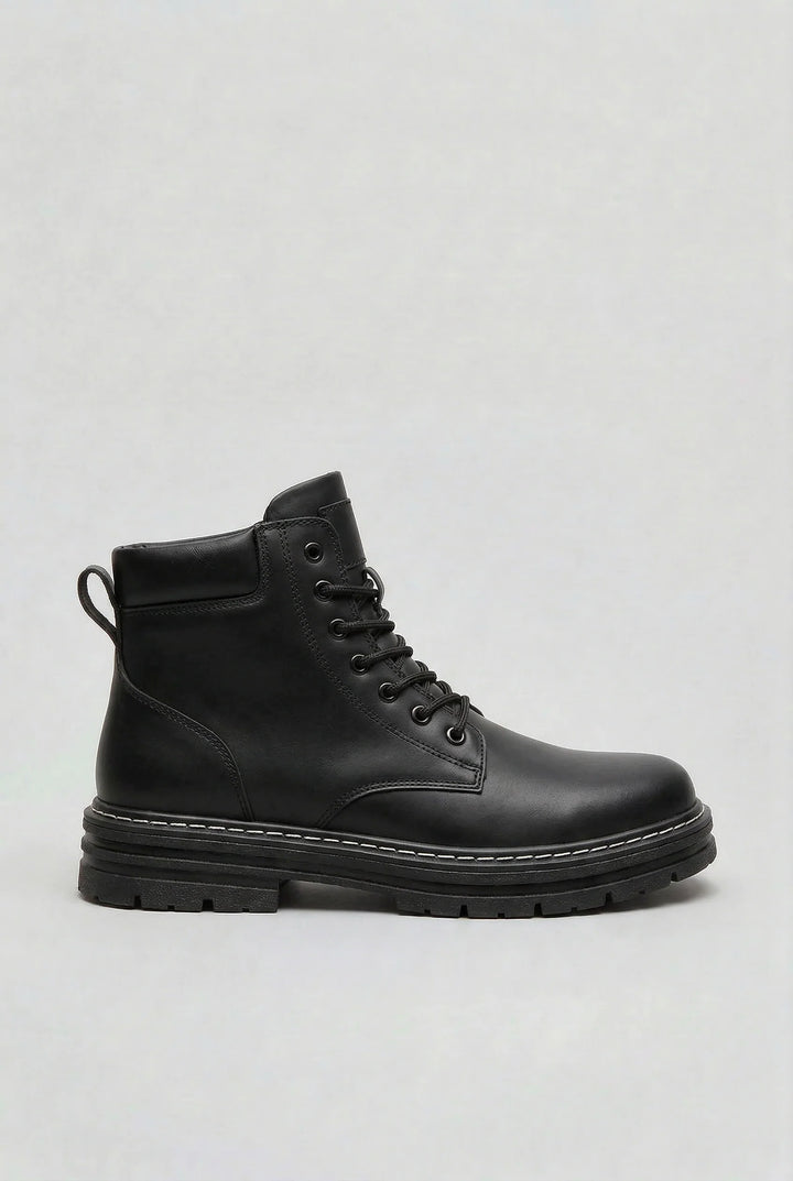 Men's lace-up boots in light grey with structured upper and rugged sole design