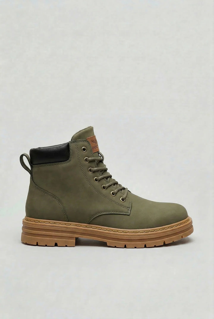 Side view of men's ankle boots showing chunky sole and adjustable lace-up closure