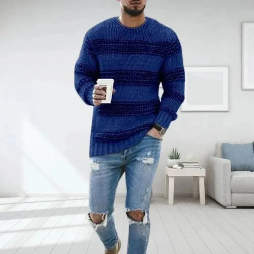 Back view of chunky knit jumper with horizontal stripe pattern and structured hem