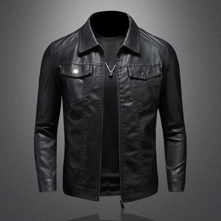 Close-up view of men's leather jacket showing buttoned chest pocket and zip front closure detail