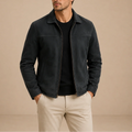 Men's zip-up jacket in charcoal with classic collar and full-zip closure worn over black jumper