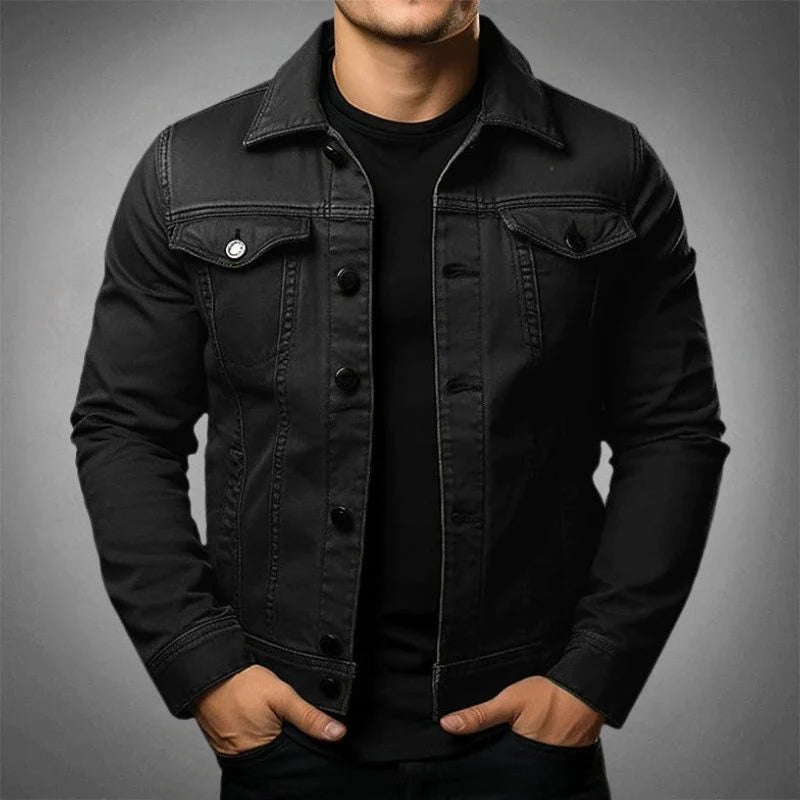 Side angle of men's tailored denim jacket highlighting the fitted silhouette and seam stitching