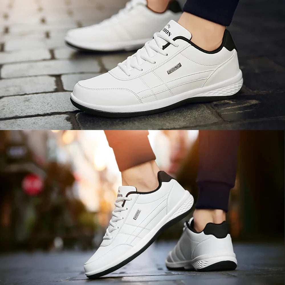 Side view of men's low-top trainers with logo badge and padded collar