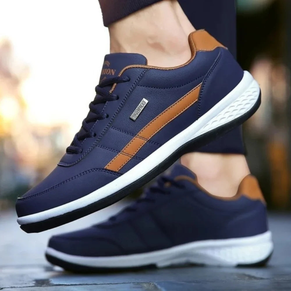 Men's white leather trainers with lace-up design and cushioned sole for everyday comfort